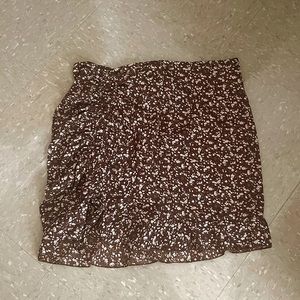 Brown floral ruched skirts with ruffles on the bottom